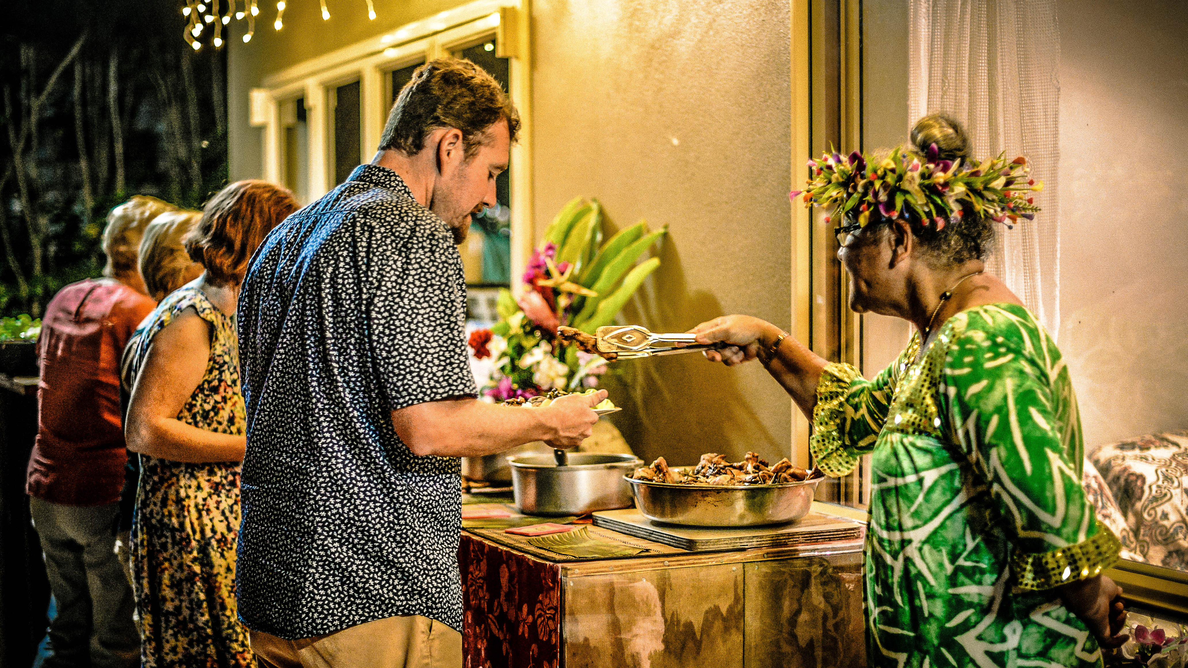 Food being served by the local host, Progressive Dinner, Rarotonga, Cook Islands